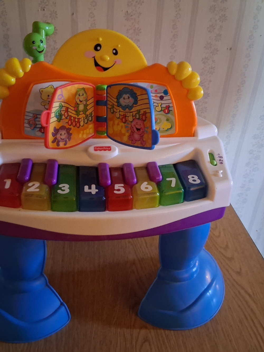 Fisher-Price Bright Rainbow Piano Playstand with Musical Book
